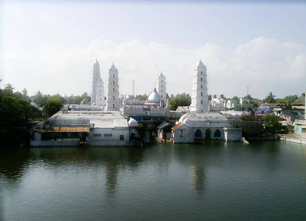 The white towers of Nagore Dargah viewed across the water